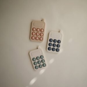 Mushie telefono spaudimo žaislas (Pop it) – Blush