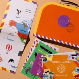 Colorful travel-themed activity set with world map pages, illustrations, and a bright orange suitcase-shaped folder for kids' learning tasks